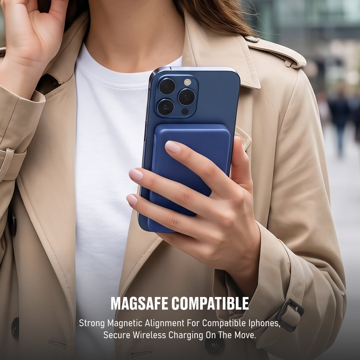 Muvtech Slim Pro 10,000mAh 3-in-1 power bank in Navy Blue, held on an iPhone