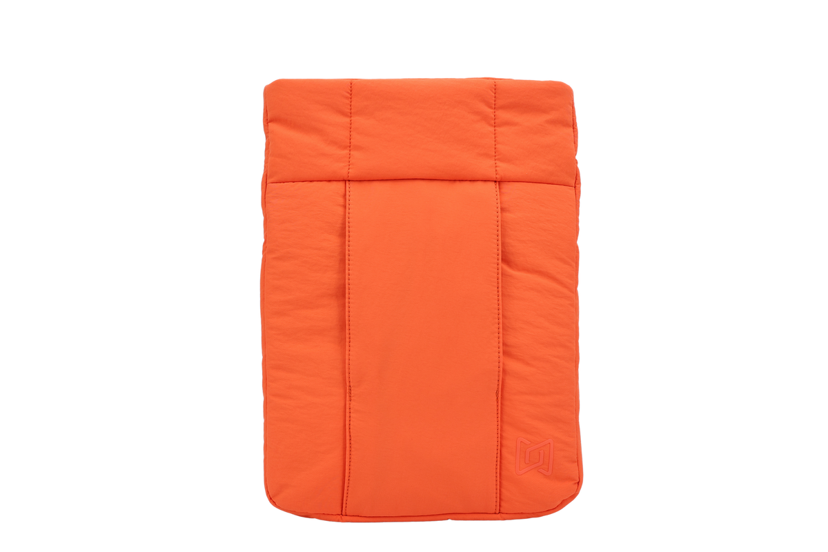 The Nest Laptop Sleeve in Rust Orange, quilted front view #Color_Rust Orange