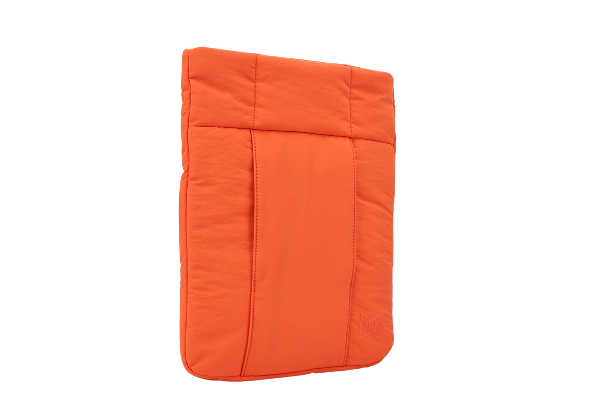 The Nest Laptop Sleeve in Rust Orange, angled view #Color_Rust Orange