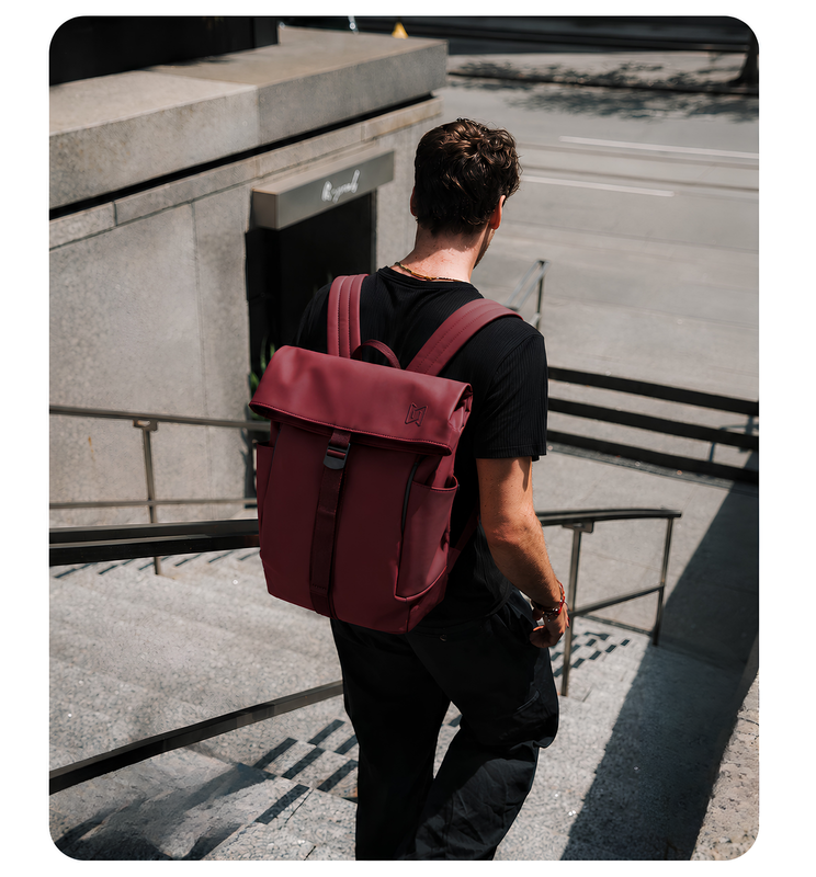 The Outpost Roll-Top Backpack in Burgundy worn on both shoulders #Color_Burgundy