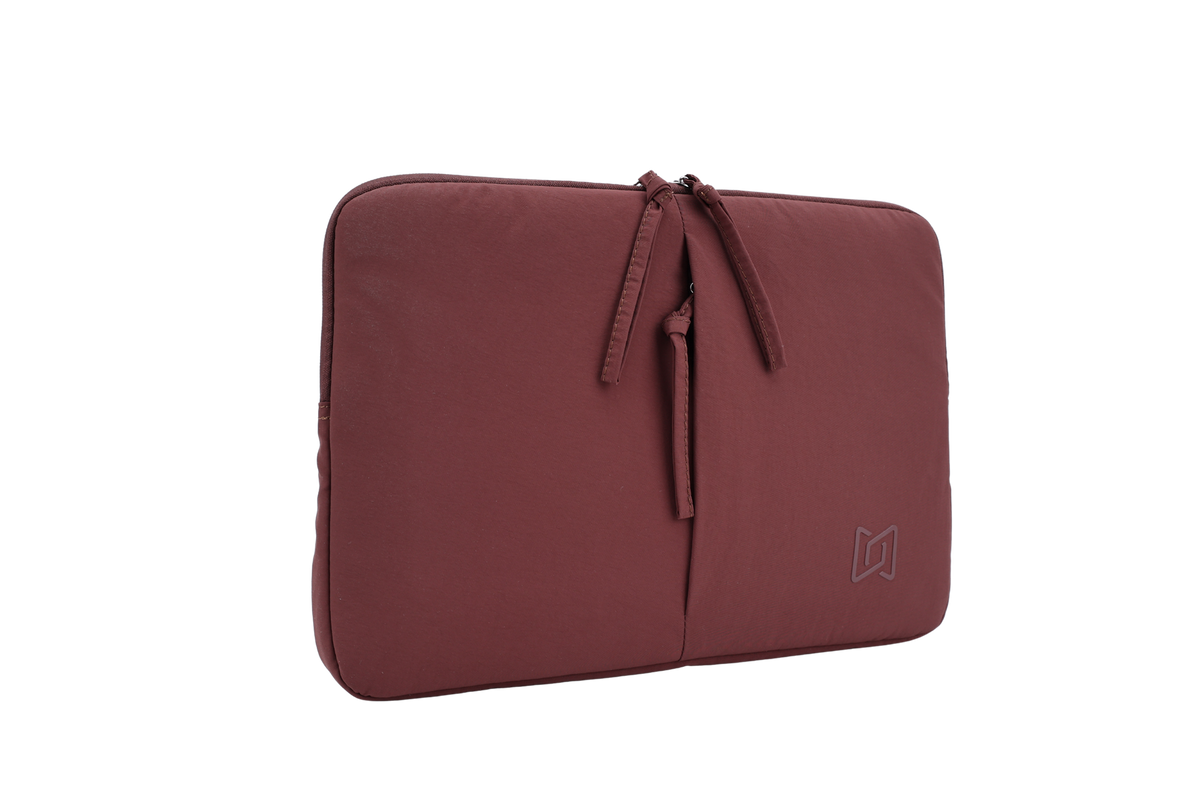 The Port Laptop Sleeve in Maroon, angled view #Color_Maroon