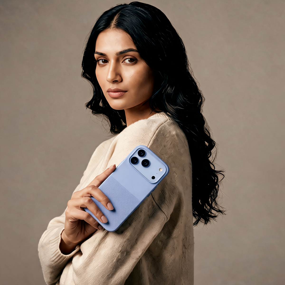 Muvtech Ditto Slim Case for iPhone 18 Pro in Glacier Blue, held by a model