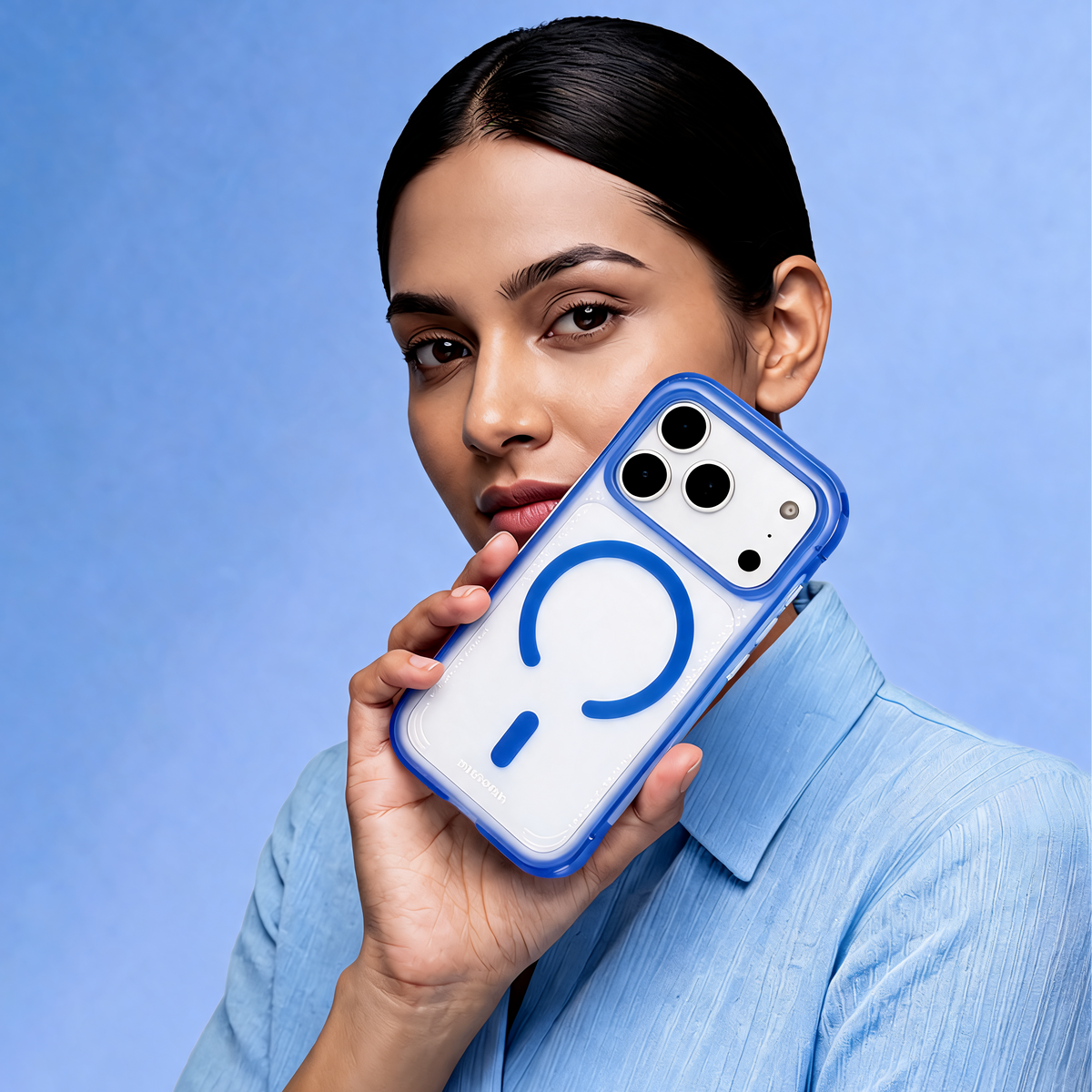 Muvtech Tinto Case for iPhone 18 Pro in Glacier Blue, held by a model