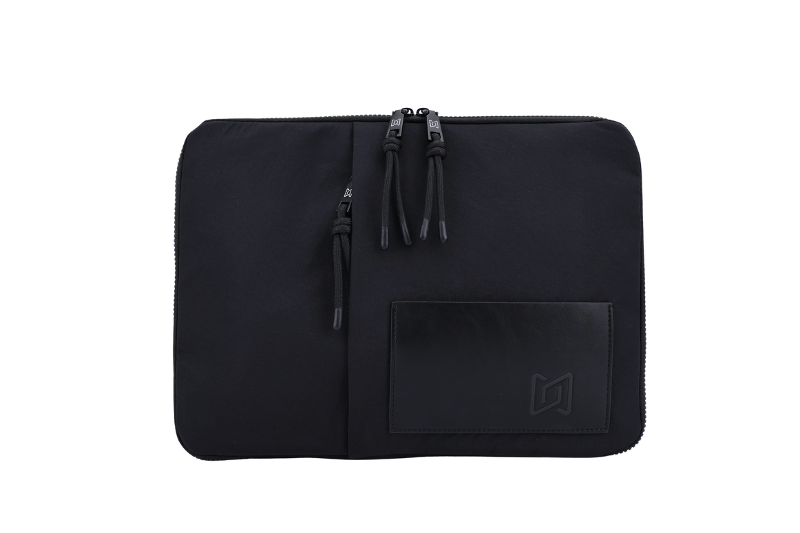 The Loft Laptop Sleeve in Black, front view with PU leather pocket #Color_Black