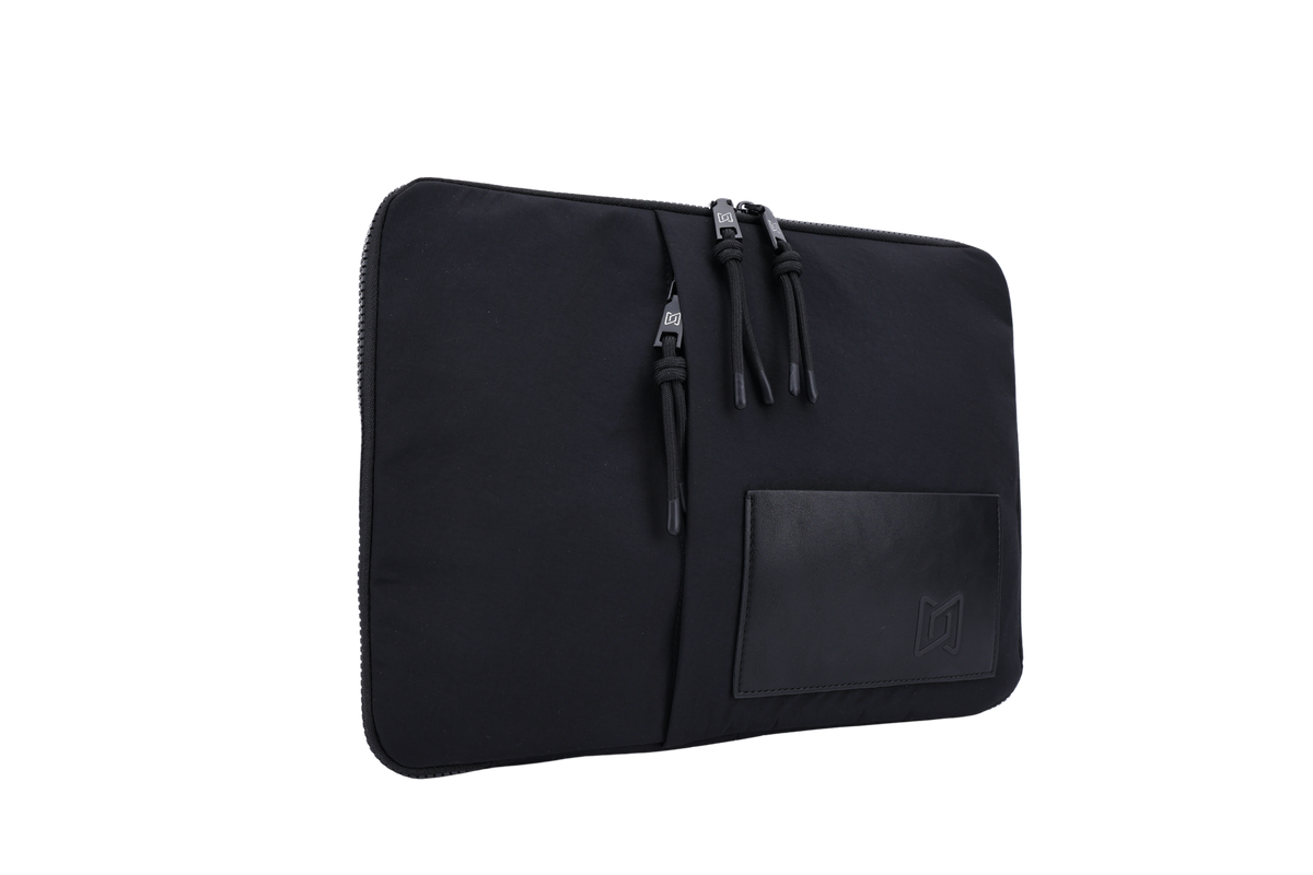 The Loft Laptop Sleeve in Black, angled view #Color_Black