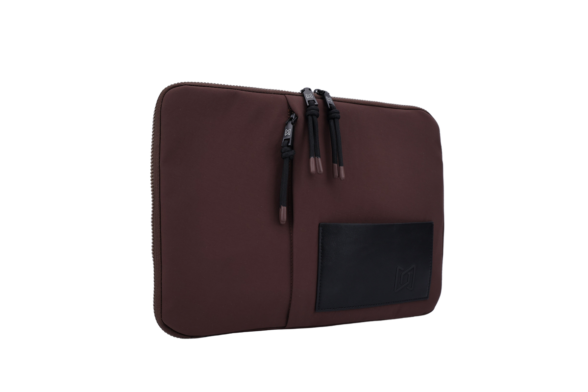The Loft Laptop Sleeve in Chocolate, angled view #Color_Chocolate