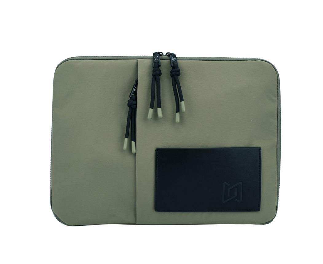 The Loft Laptop Sleeve in Green, front view with PU leather pocket #Color_Green