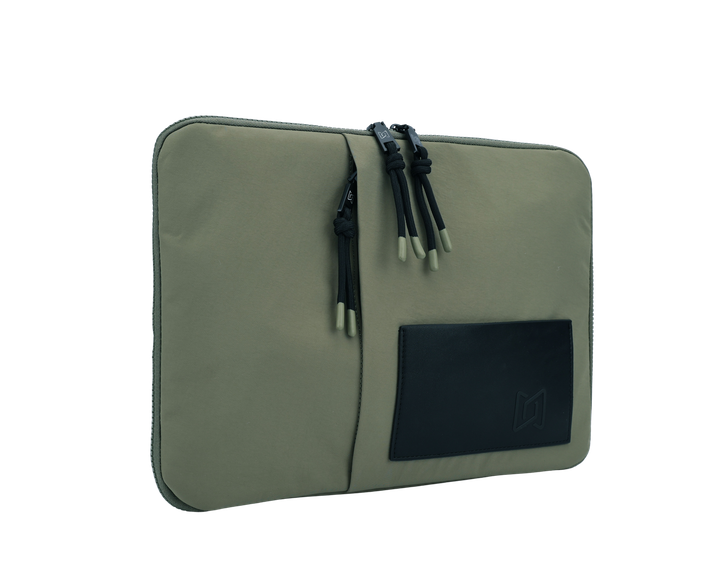 The Loft Laptop Sleeve in Green, angled view #Color_Green