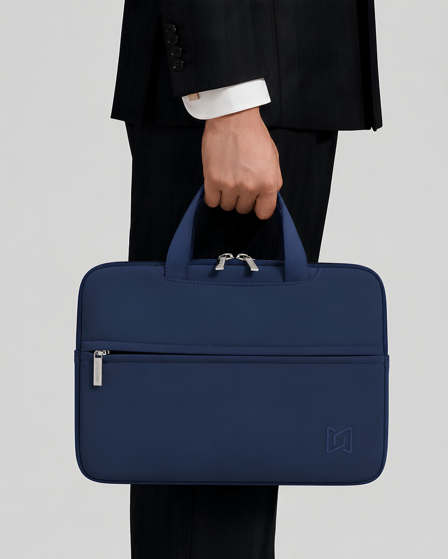 The Studio Portfolio in Blue carried by hand #Color_Blue