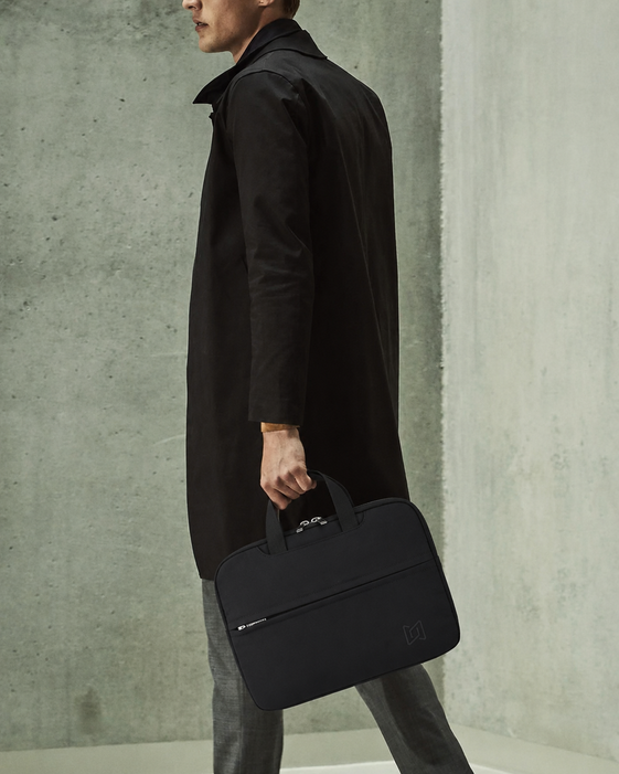 The Studio Portfolio in Black carried by hand #Color_Black