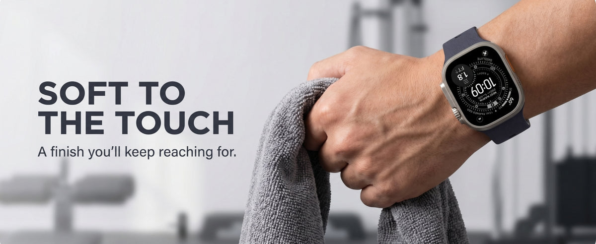 Duo strap in Midnight on a wrist holding a gym towel. Soft to the touch.